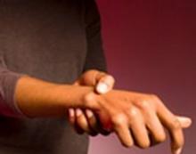 woman holding wrist.jpg
